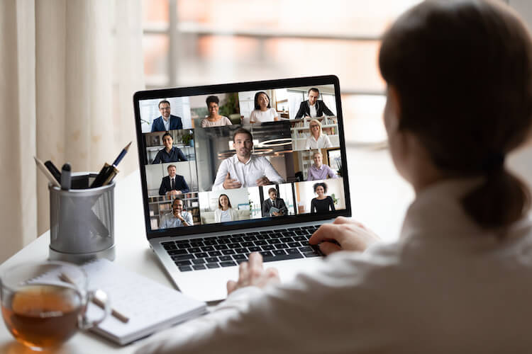 Employee on a virtual meeting while working from home